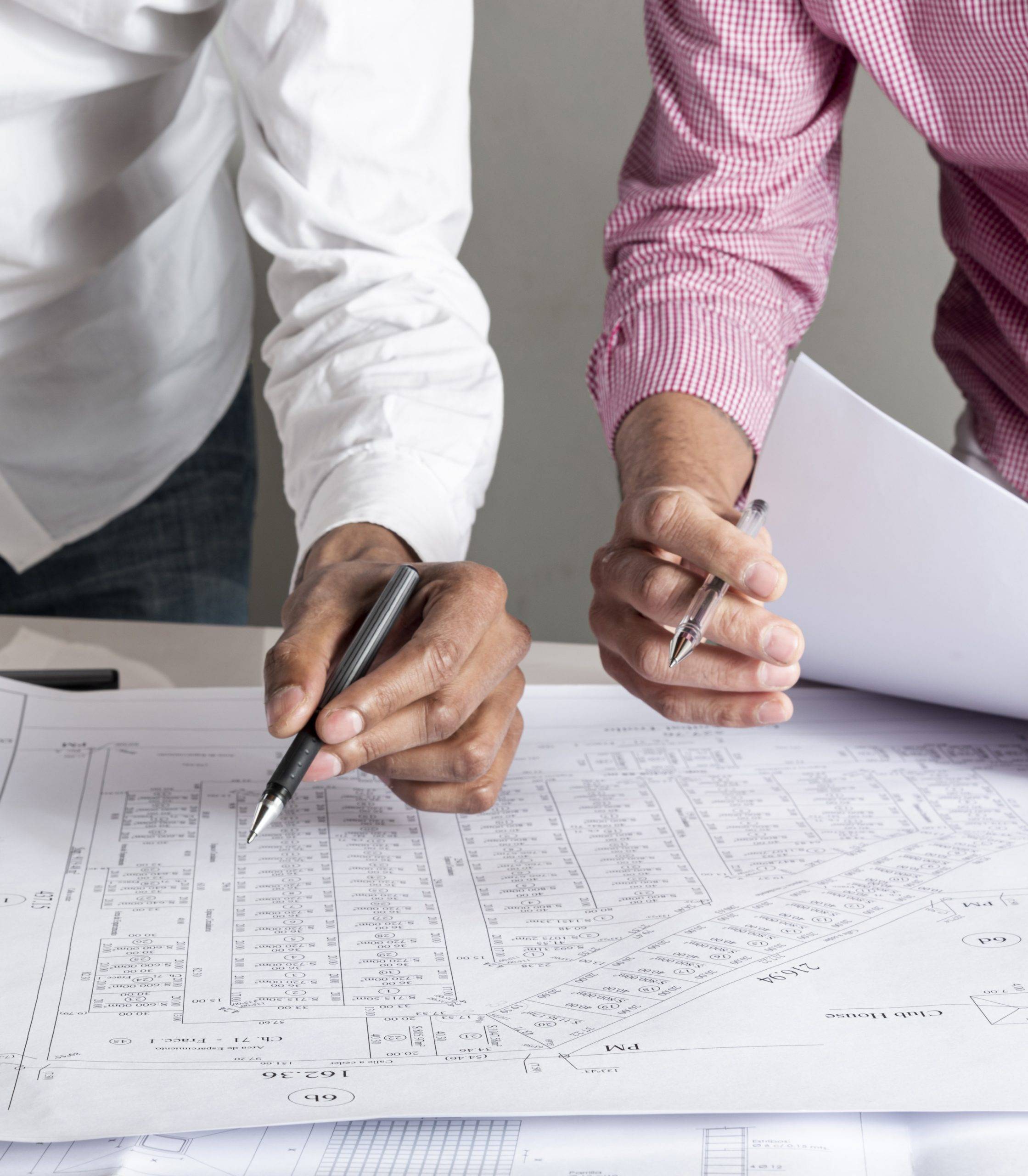 people working blueprint city